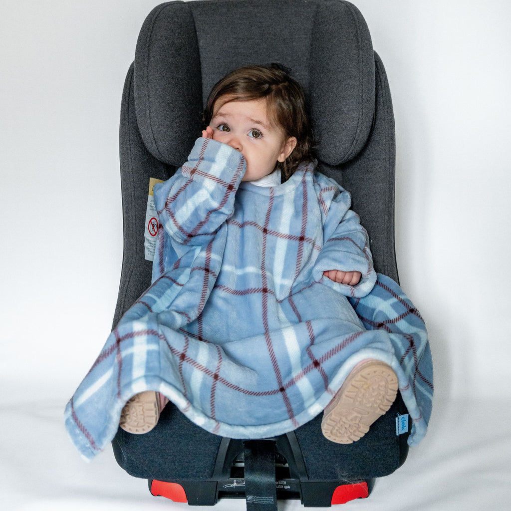 Car_seat_blanket_blue_light_blue_checkered_neutral_girl_sitting