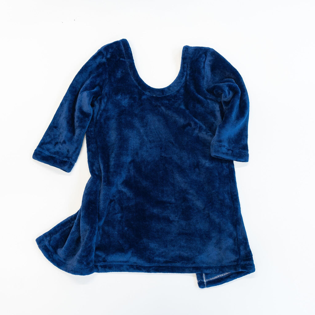 A front view of a  deep blue velvet-textured car seat blankie. It is laid flat against a plain white background.