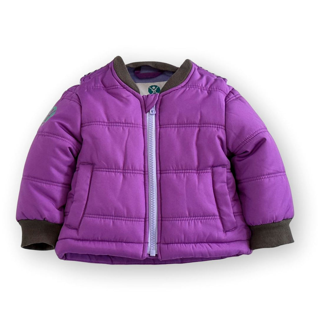 Sparkalot/Purple
Purple carseat coat with charcoal cuffs zipped up displayed on a white background.