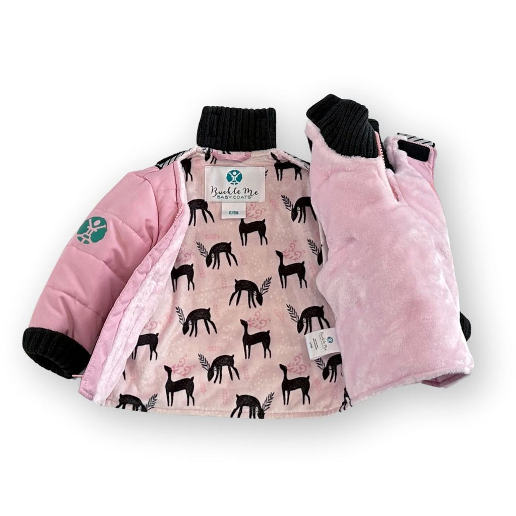 Do-Rae-Mi/Pink
Pink car seat coat with charcoal grey cuffs is displayed on a white background.  The coat has a pink and deer print sherpa interior. The coat is unzipped and the hood is not shown.