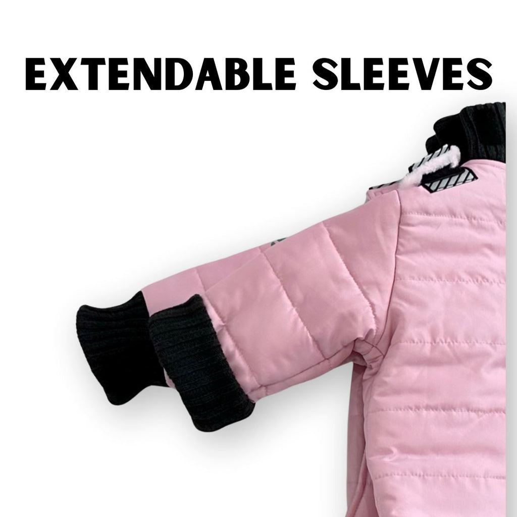 Do-Rae-Mi/Pink
Camera is zoomed in on the sleeves of a purple carseat coat.  One cuff is rolled up and the other is uncuffed to show the different length options.  